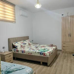 Stomici , Nderlysaj Albania